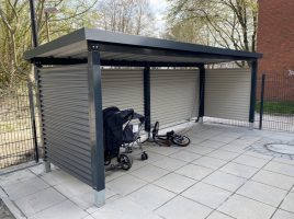 Überdachung für Kinderwagen vor Kitas und Arztpraxen