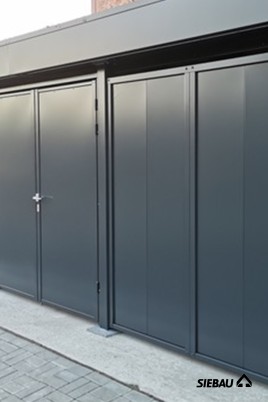 Einhausung mit Dachbegrünung für Wohn- und Geschäftshaus