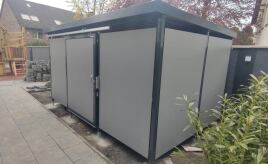 Mülleinhausung mit HPL Wandfeldern