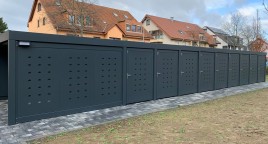 Stauraum und Mülltonnenunterstand für Mehrfamilienhaus
