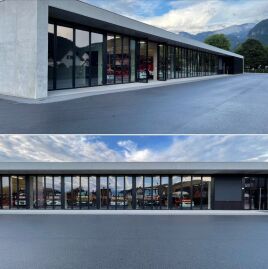 Vollverglaste Fassade mit neun ALPGATE Falttoren für die Feuerwehr Götzis in Vorarlberg!